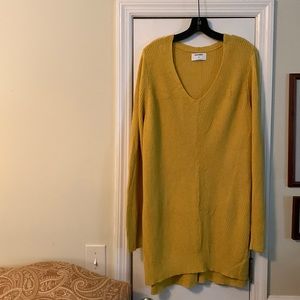 Yellow gold sweater.